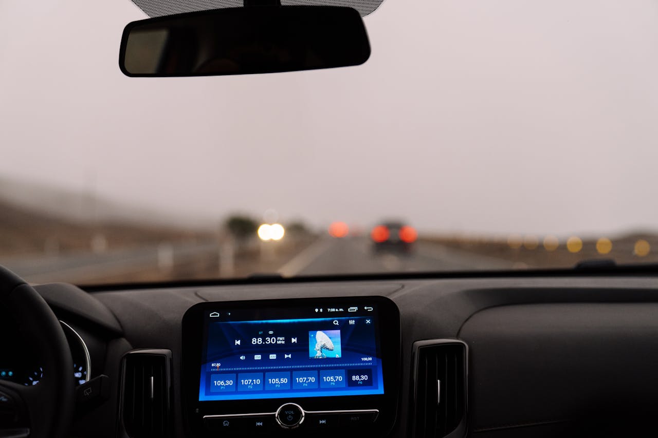Crafting Captivating Headlines: Your awesome post title goes here Interior view of a car dashboard on an open road during the day. Perfect for travel-themed projects.