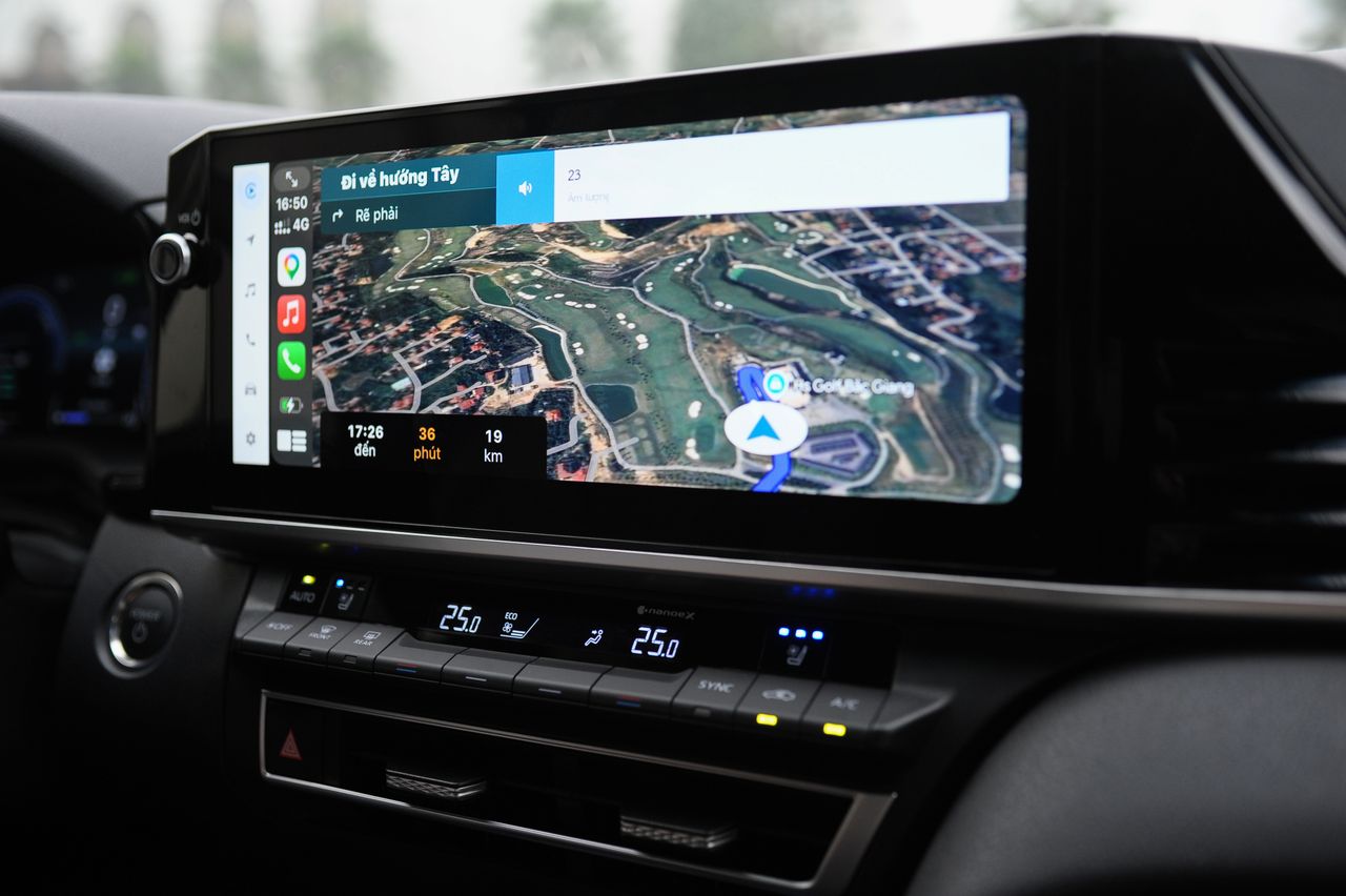 Modern in-car navigation system showing a digital map and route details.